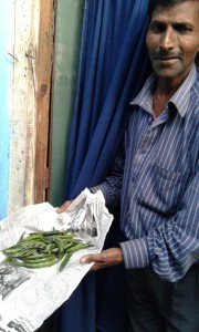 Mangal Singh, receiving the last distribution of NESFAS Community Garden veggies...