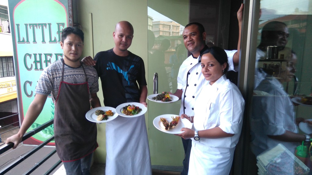 Chefs Artet Kharsati, Daniel Syngkon, Osbert Rynjah and Leony Rynjah holding their creations.