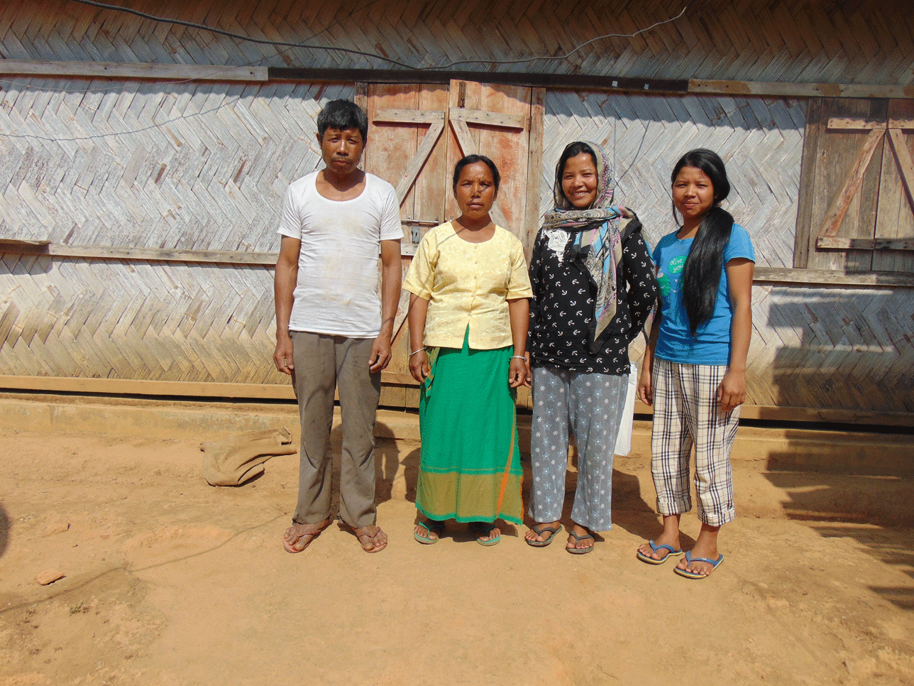 Romiss Sh Sangma and her family. Photo: NESFAS/Damanki War 