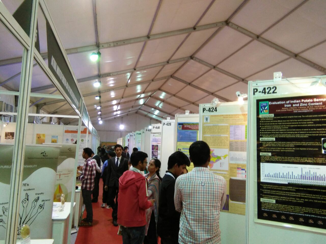 A hallway of poster from various organisations who share their research experiences for sustainable management and utilisation of Agrobiodiversity.